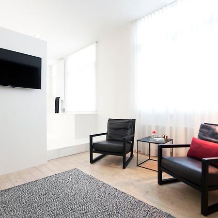 Maison Nationale City Flats & Suites Antwerpen Rum bild A room at the hotel
