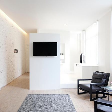 Maison Nationale City Flats & Suites Antwerpen Rum bild A room at the hotel