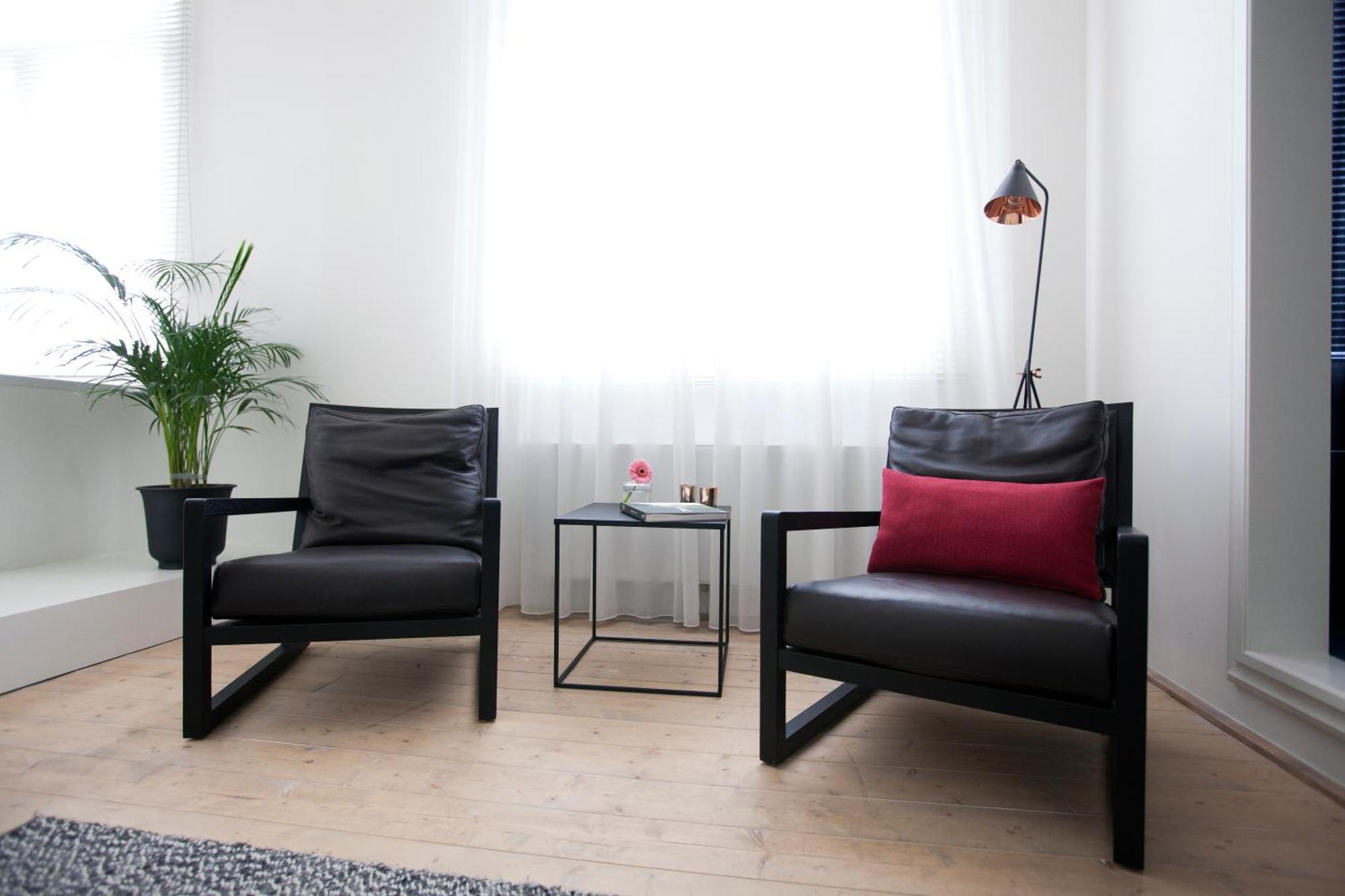 Maison Nationale City Flats & Suites Antwerpen Rum bild Interior of a room at the hotel