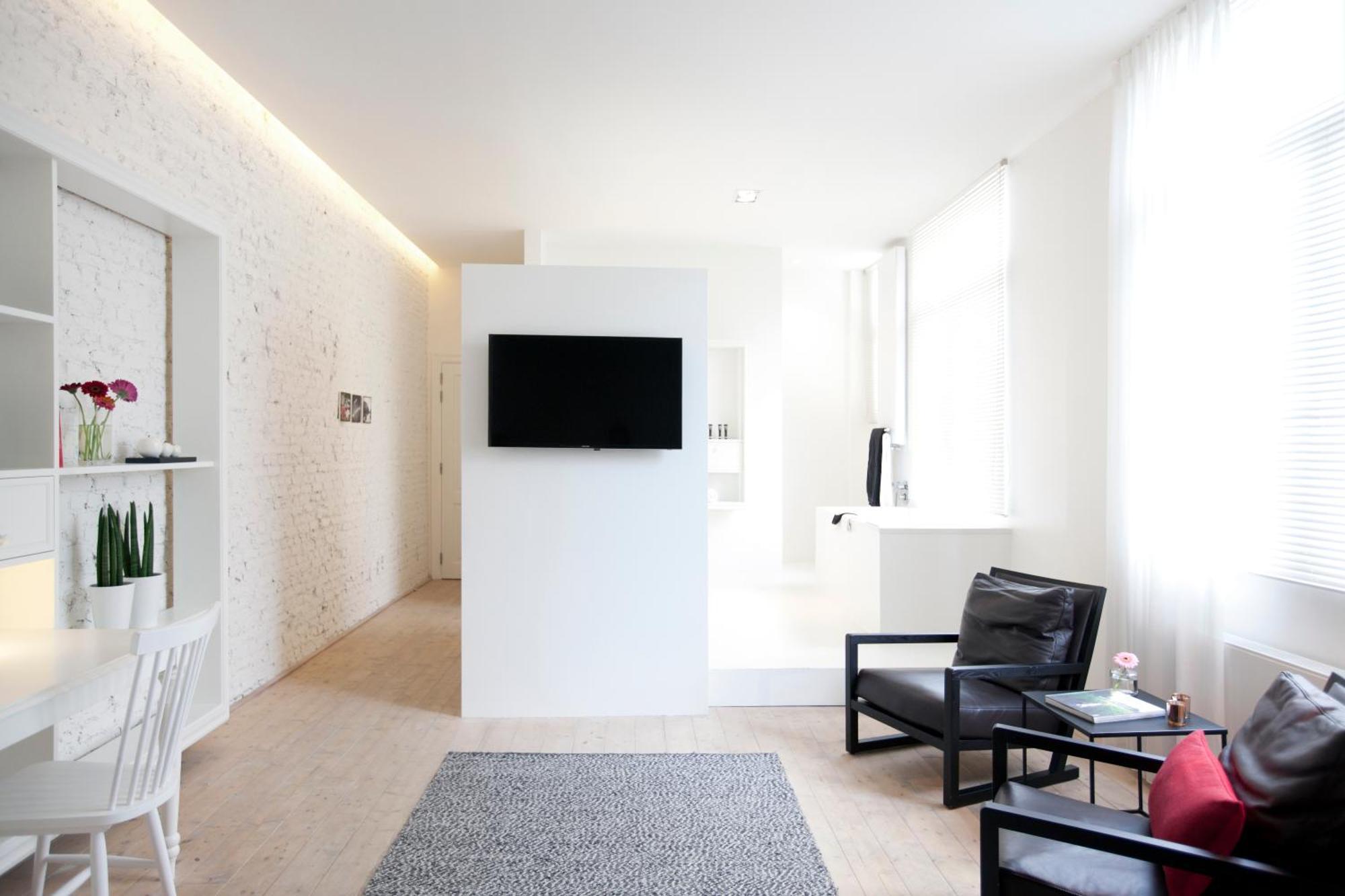 Maison Nationale City Flats & Suites Antwerpen Rum bild A room at the hotel